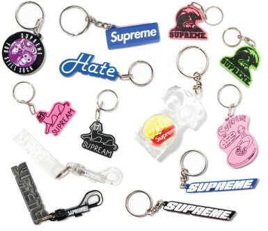 View full screen - View 1 of Lot 58. A GROUP OF 14 RUBBER SUPREME KEYCHAINS.