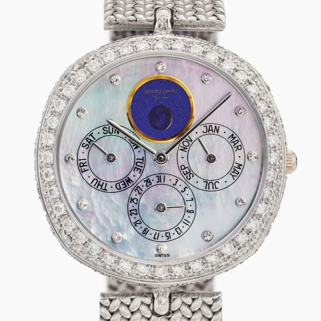 View full screen - View 1 of Lot 102. Reference G1970.8 | Retailed by Royama: A white gold and diamond-set automatic perpetual calendar bracelet watch with moon phases and mother-of-pearl dial, Circa 1980.