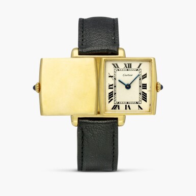 View full screen - View 1 of Lot 2295. Tank Reversible | A yellow gold rectangular reversible wristwatch with original gold deployant buckle, Circa 1972-73.
