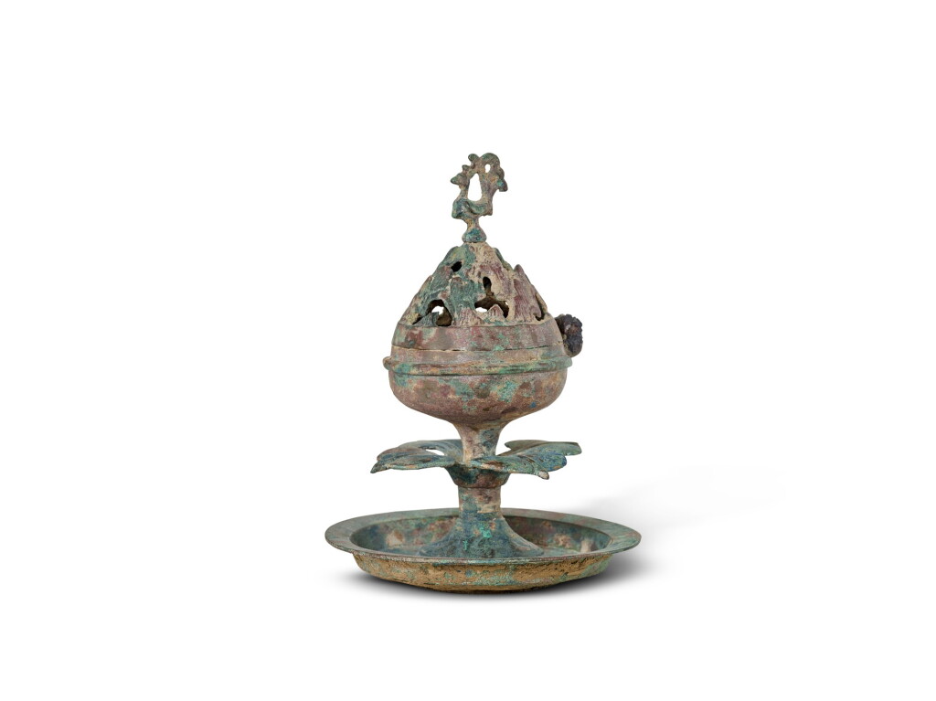 View full screen - View 1 of Lot 5052. An archaic bronze 'phoenix' incense burner Western Han dynasty 西漢 銅立鳳博山爐.