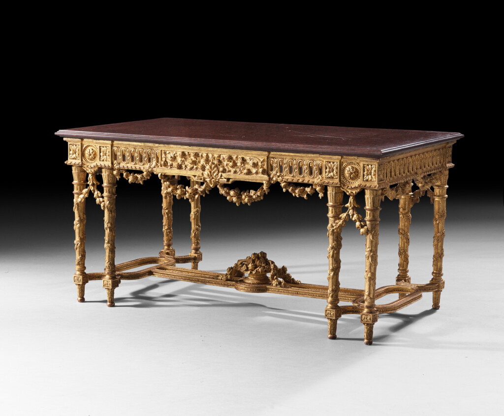 View full screen - View 1 of Lot 107. A giltwood center table, Louis XVI, circa 1780 | Table de milieu en bois doré d'époque Louis XVI, vers 1780.