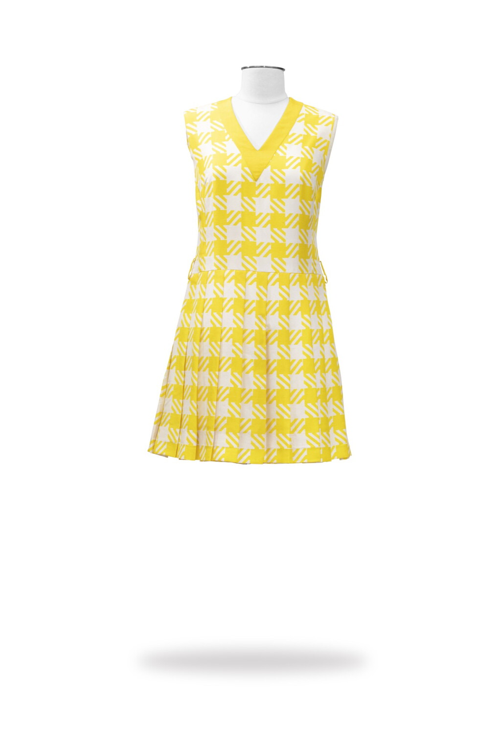 View full screen - View 1 of Lot 15. Nina Ricci, Haute Couture, circa 1965, Yellow and ivory dress and jacket | Robe courte à jupe plissée, veste assortie.