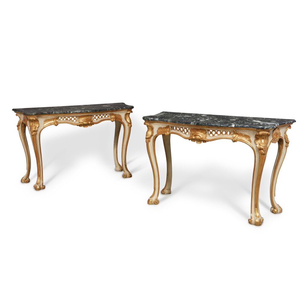 View full screen - View 1 of Lot 170. A Pair of Neapolitan Rococo White Painted Parcel Gilt Console Tables with Levanto Marble Tops, Circa 1750.