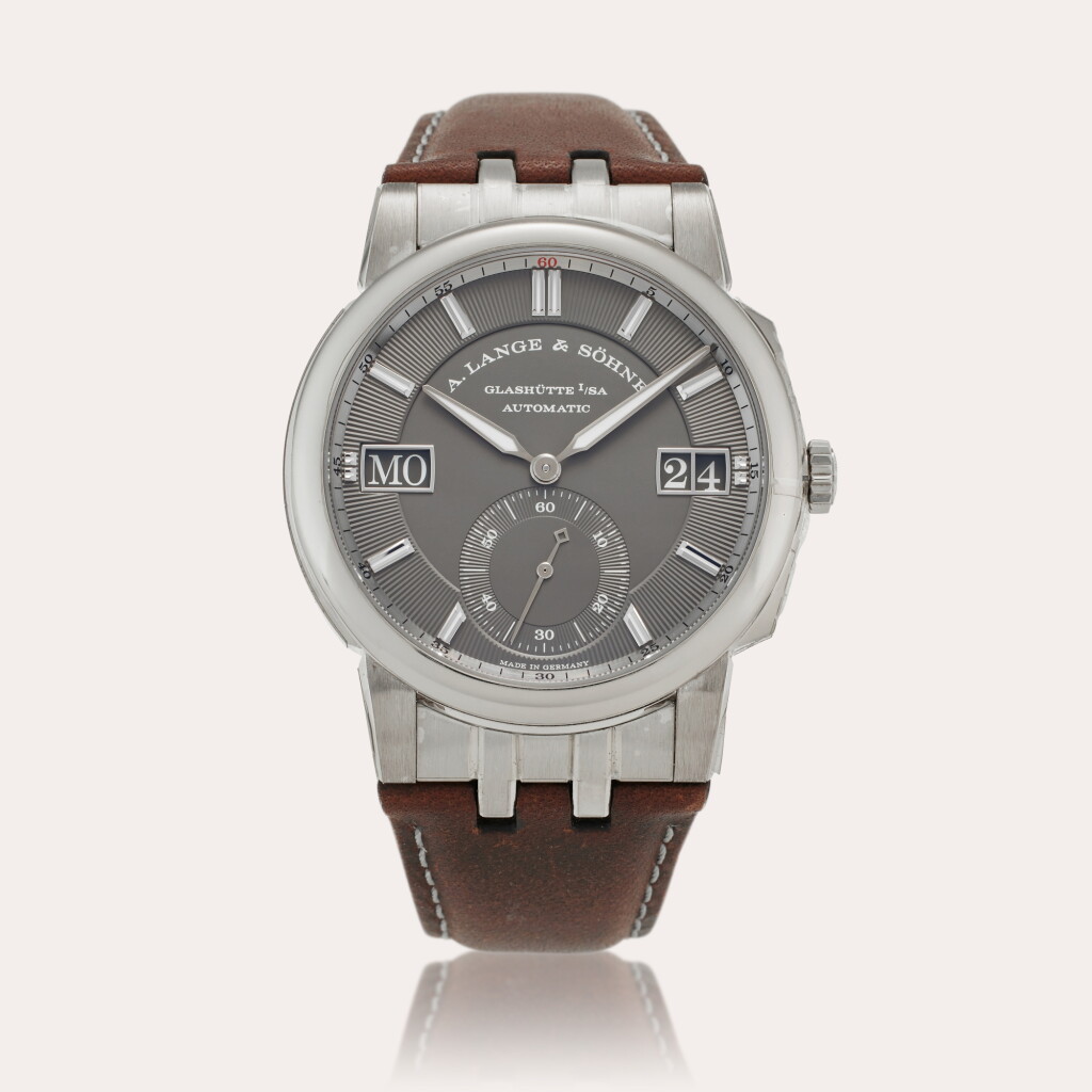 View full screen - View 1 of Lot 115. Reference 363.038 Odysseus | A white gold automatic wristwatch with day and digital date display, Circa 2020.