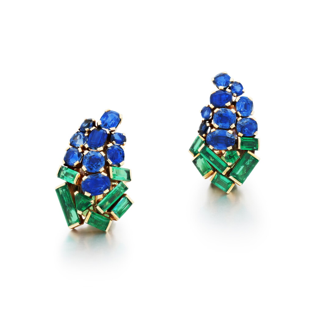 View full screen - View 1 of Lot 535. Pair of emerald and sapphire ear clips, circa 1957.