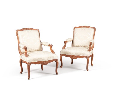 View full screen - View 1 of Lot 159. A PAIR OF LOUIS XV CARVED BEECHWOOD ARMCHAIRS | PAIRE DE FAUTEUILS EN HÊTRE SCULPTÉ D'ÉPOQUE LOUIS XV.