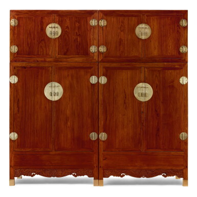 View full screen - View 1 of Lot 88. A RARE PAIR OF HUANGHUALI COMPOUND CABINETS, SIJIANGUI MING DYNASTY, 17TH CENTURY | 明十七世紀 黃花梨雕雙龍供蓮紋四件頂箱櫃成對.