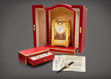 View full screen - View 1 of Lot 2276. Breguet Sympathique, No 2 Sold to Tiffany & Co. | A gilt bronze astronomical annual calendar clock with phases and age of the moon, equation of time, centigrade thermometer with 8 days power reserve indication and 5-seconds remontoire winding spring detent chronometer escapement and matching yellow gold tourbillon wristwatch with power reserve indication and mechanism for instantaneous re-setting and correction with the masterpiece clock, Circa 1996 | 寶璣 | BREGUET SYMPATHIQUE 編號 2 售予 TIFFANY & CO. | 鍍金銅製天文年曆座鐘,備月相、時間等式、溫度計、8天動力儲備顯示、5秒恆定動力衝擊式擒縱結構及黃金陀飛輪腕錶,備動力儲備顯示及與座鐘瞬間同步時間裝置,約1996年製.