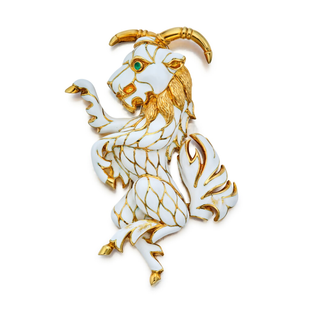 View full screen - View 1 of Lot 410. Gold, Enamel, and Emerald 'Dancing Goat' Clip-Brooch.