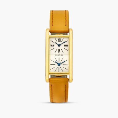 View full screen - View 1 of Lot 2464. Tank Cintrée Dual Time | A very rare yellow gold dual time wristwatch, Circa 1975.