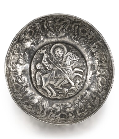 View full screen - View 1 of Lot 486. AN OTTOMAN SILVER REPOUSSÉ BOWL FEATURING ST. GEORGE AND THE DRAGON, GREECE, EARLY 17TH CENTURY.