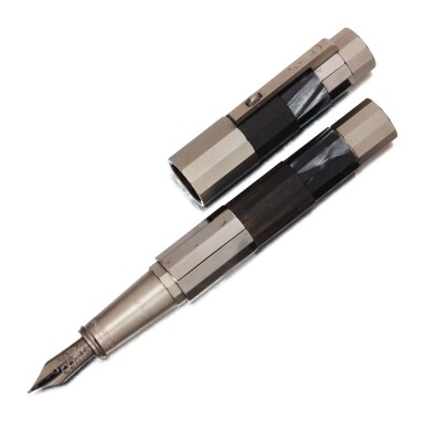 View full screen - View 1 of Lot 57. OMAS | A LIMITED EDITION STERLING SILVER, TITANIUM, EBONY, CELLULOID AND RESIN FOUNTAIN PEN, CIRCA 2010.