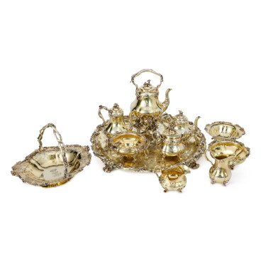 View full screen - View 1 of Lot 719. A Victorian Silver-Gilt Nine Piece Tea and Coffee Set With Circular Tray for the Russian Market, John S. Hunt for Hunt & Roskell, London, 1849.
