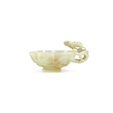 View full screen - View 1 of Lot 253. A superbly carved and extremely rare celadon jade 'dragon' foliate cup, Song dynasty | 宋 青白玉花式龍耳盃.