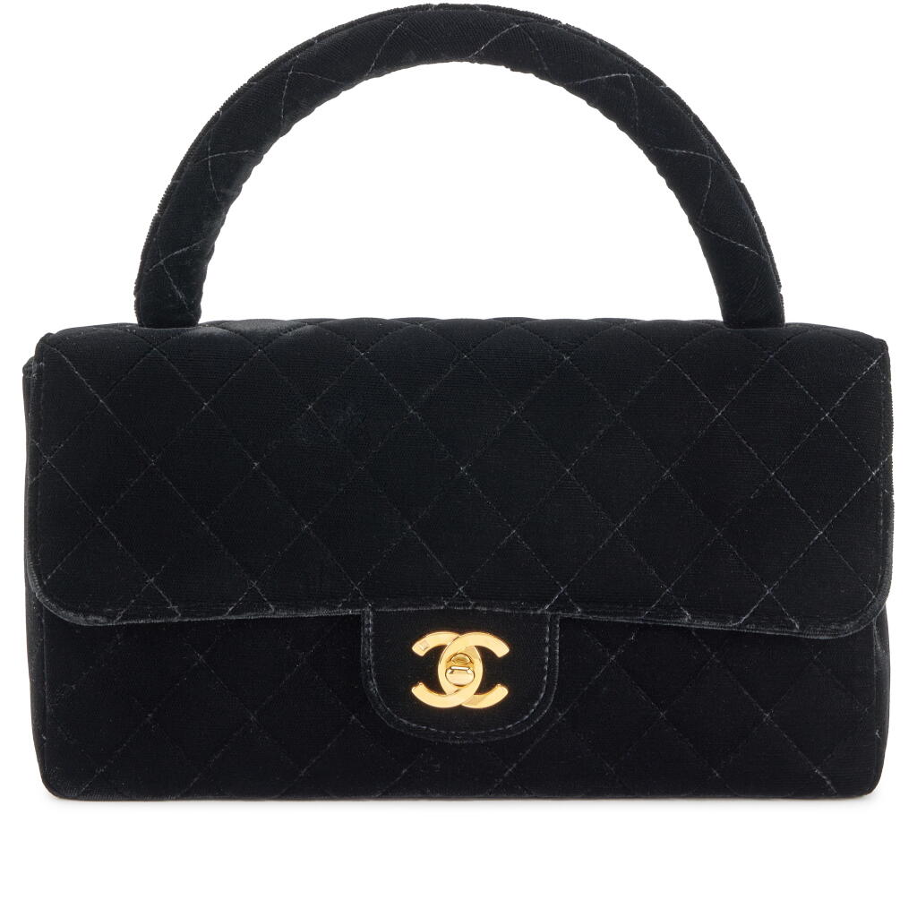 View full screen - View 1 of Lot 68. Black Quilted Velvet Medium Top Handle Flap Bag Gold Hardware, 1991-1994.