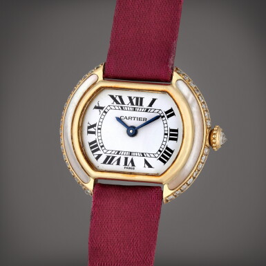 View full screen - View 1 of Lot 262. Ellipse, Paris | A yellow gold and diamond-set wristwatch with Mother of pearl, Circa 1985.