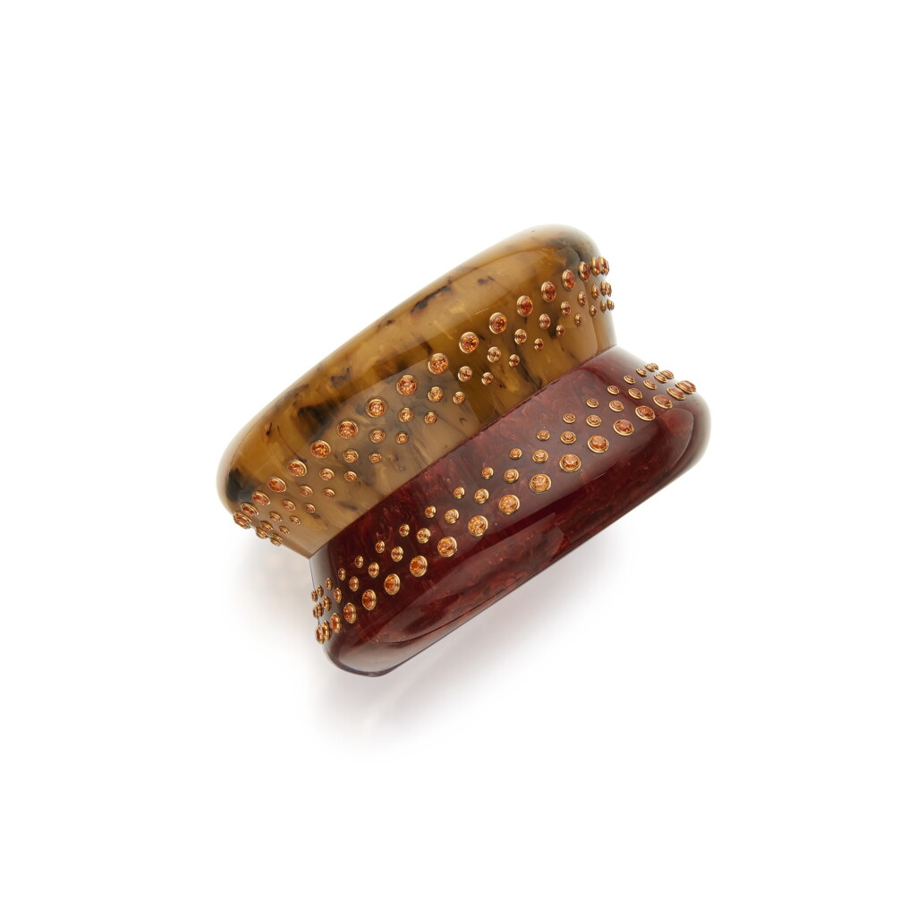 View full screen - View 1 of Lot 376. Two-Color Bakelite and Spessartine Garnet Bangle-Bracelet.