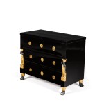 An Austrian ebonized and parcel-gilt commode, early 19th century