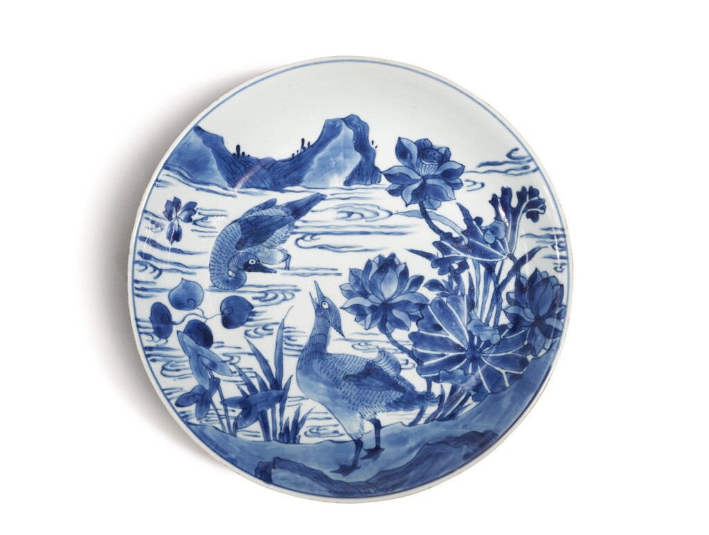 View full screen - View 1 of Lot 684. A blue and white 'ducks and lotus' dish, Qing dynasty, 17th century.