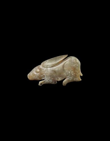 View full screen - View 1 of Lot 930. A yellowish-green jade 'hare' pendant, Western Zhou dynasty | 西周 玉兔.