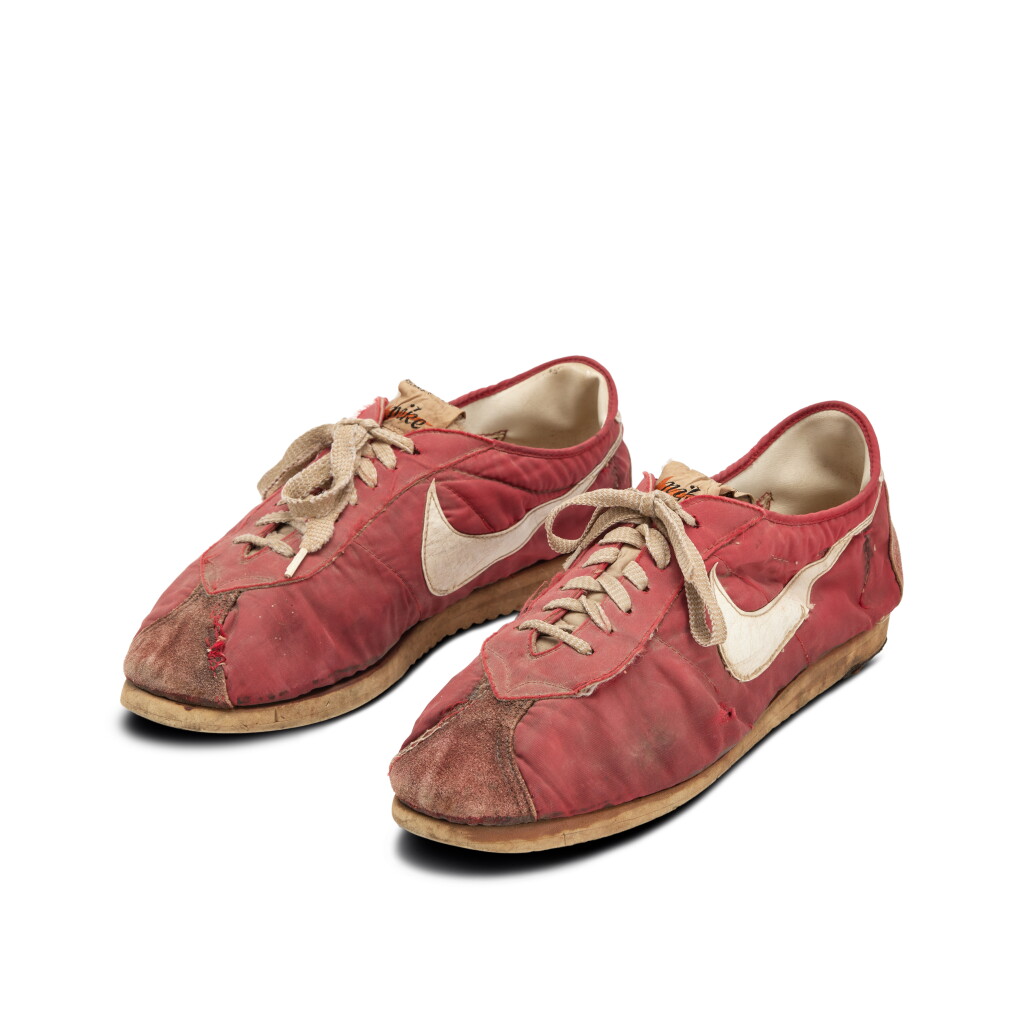 View full screen - View 1 of Lot 1. Steve Prefontaine’s Personal and Worn Nike Kenya Red Sneakers | Modified by Bill Bowerman with Waffle Soles on the Heels | Letter of Opinion .