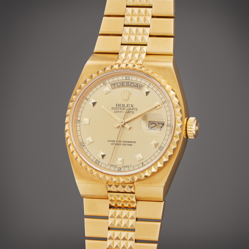 View full screen - View 1 of Lot 14. Reference 19028 Oysterquartz Day-Date 'Pyramid' | A yellow gold wristwatch with day, date and bracelet, Circa 1987.