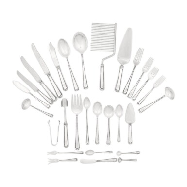 View full screen - View 1 of Lot 157. An American 'Scroll & Bead' pattern silver flatware service, Cartier, 20th century.