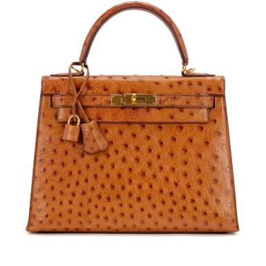 View full screen - View 1 of Lot 37. Cognac Ostrich Kelly 28 Sellier Gold Hardware, 1985.
