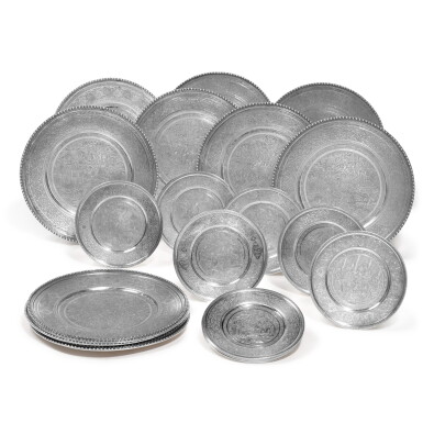 View full screen - View 1 of Lot 317. A Set of Twelve Persian Silver Chargers and Twelve Bread Plates, Mid 20th Century.