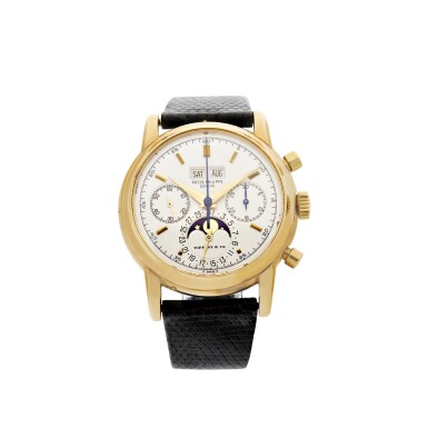 View full screen - View 1 of Lot 33. REFERENCE 2499/100 'FOURTH SERIES' RETAILED BY TIFFANY & CO.: A YELLOW GOLD PERPETUAL CALENDAR CHRONOGRAPH WRISTWATCH WITH MOON PHASES, 24 HOURS AND LEAP YEAR INDICATION, MADE IN 1981.