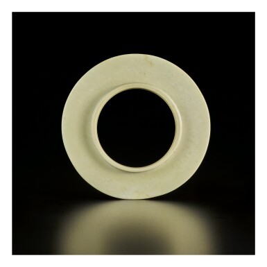 View full screen - View 1 of Lot 573. A JADE DISC, SHANG DYNASTY.