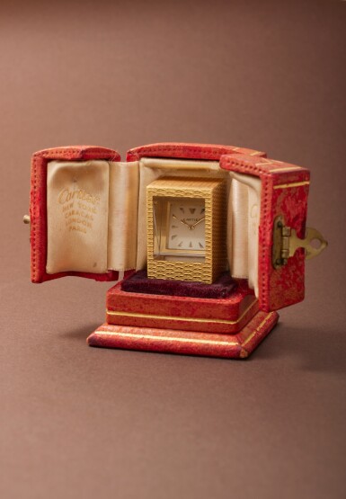 View full screen - View 1 of Lot 31. A fine and unusual yellow gold miniature prism mystery clock with fitted presentation box, Circa 1950s.