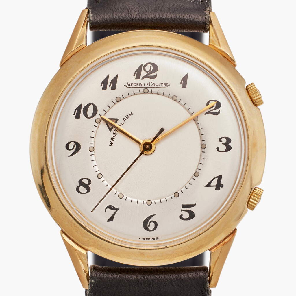 View full screen - View 1 of Lot 166. Memovox | A yellow gold wristwatch with alarm and Breguet numerals, Circa 1950s.