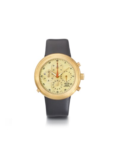 View full screen - View 1 of Lot 100. IKEPOD | HEMIPODE A YELLOW GOLD AUTOMATIC DUAL TIME CHRONOGRAPH WRISTWATCH WITH REGISTERS AND DATE CIRCA 1999.