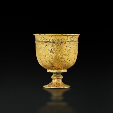 View full screen - View 1 of Lot 3621. A small finely engraved gilt-bronze 'hunting' stem cup, Tang dynasty | 唐 鎏金銅鏨花狩獵紋高足小盃.