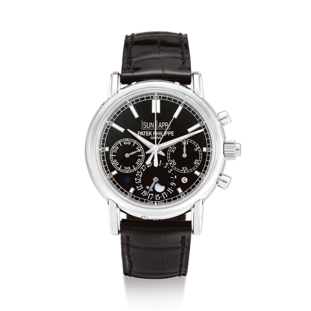 View full screen - View 1 of Lot 2048. PATEK PHILIPPE | REFERENCE 5204 A BRAND NEW PLATINUM PERPETUAL CALENDAR SPLIT SECONDS CHRONOGRAPH WRISTWATCH WITH MOON PHASES, LEAP YEAR AND DAY AND NIGHT INDICATION, CIRCA 2017 | 百達翡麗 | "型號5204 全新鉑金萬年曆追針計時腕錶,備月相、閏年及晝夜顯示,機芯編號5253014,錶殼編號6135112,約2017年製".