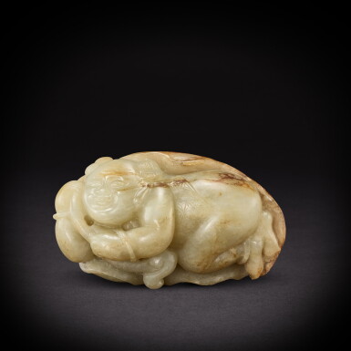 View full screen - View 1 of Lot 6888. A pale celadon and russet jade 'boy and lotus' pebble, 17th century | 十七世紀 青白玉持蓮童子.