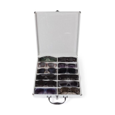 View full screen - View 1 of Lot 76. A group of twelve various designer sunglasses in a glasses travelling case by E.B. Meyrowitz.