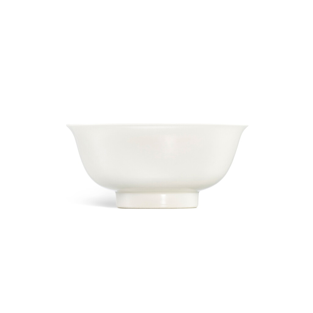 View full screen - View 1 of Lot 3693. A fine and rare anhua-decorated 'sweet-white' 'dragon' tea bowl, Incised seal mark and period of Yongle | 明永樂 甜白釉暗花雙龍紋茶鍾 《永樂年製》刻款.