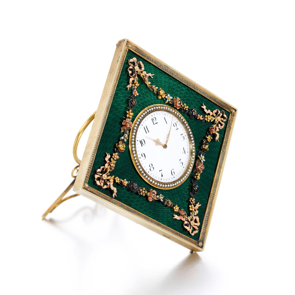 View full screen - View 1 of Lot 102. A Fabergé varicoloured gold and silver-mounted guilloché enamel clock, workmaster Michael Perkhin, St Petersburg, circa 1890.