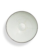 A qingbai lobed bowl, Song dynasty | 宋 青白釉葵口盌