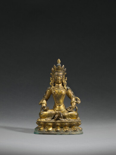 View full screen - View 1 of Lot 77. A gilt-bronze figure of a Bodhisattva, Qing dynasty, Qianlong period | 清乾隆 鎏金銅菩薩坐像.