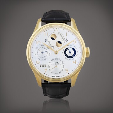 View full screen - View 1 of Lot 469. Portugieser Perpetual Calendar, reference IW502107 Montre bracelet à quantième perpétuel en or jaune avec jour, date, phases de lune des hémisphères nord et sud, affichage numérique de l'année et indicateur de 7 jours de réserve de marche | Yellow gold perpetual calendar wristwatch with day, date, moon phases for the northern and southern hemisphere, digital year display and 7 days power reserve indication Vers 2005 | Circa 2005.