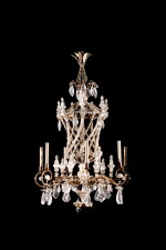 A gilt-metal and glass seven-light chandelier, attributed to Maison Baguès, 20th century | Lustre à sept bras de lumière en métal doré et cristal de roche, attribué à la maison Baguès, XXe siècle