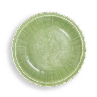 View full screen - View 1 of Lot 5584. A Longquan celadon-glazed 'crab apple' charger, Ming dynasty | 明 龍泉窰青釉海紅紋花口大盤.