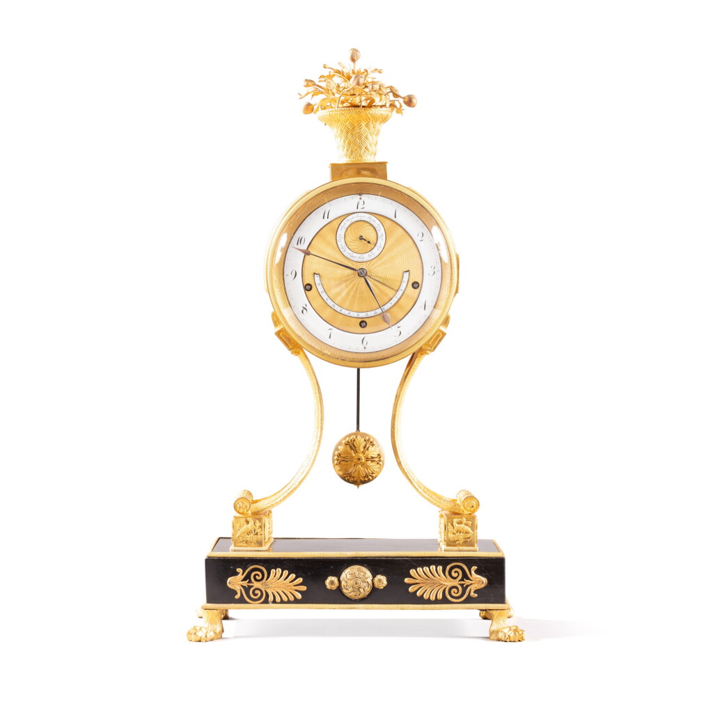 View full screen - View 1 of Lot 564. An Austrian gilt-bronze mantel clock by Carl Wurm, early 19th century.