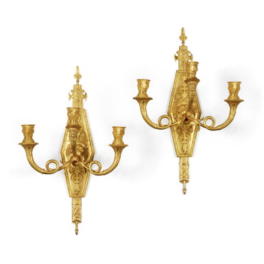 View full screen - View 1 of Lot 1167. A Pair of Empire Gilt-Bronze Three-Branch Wall-Lights attributed to Lucien-François Feuchère, circa 1815-1820.