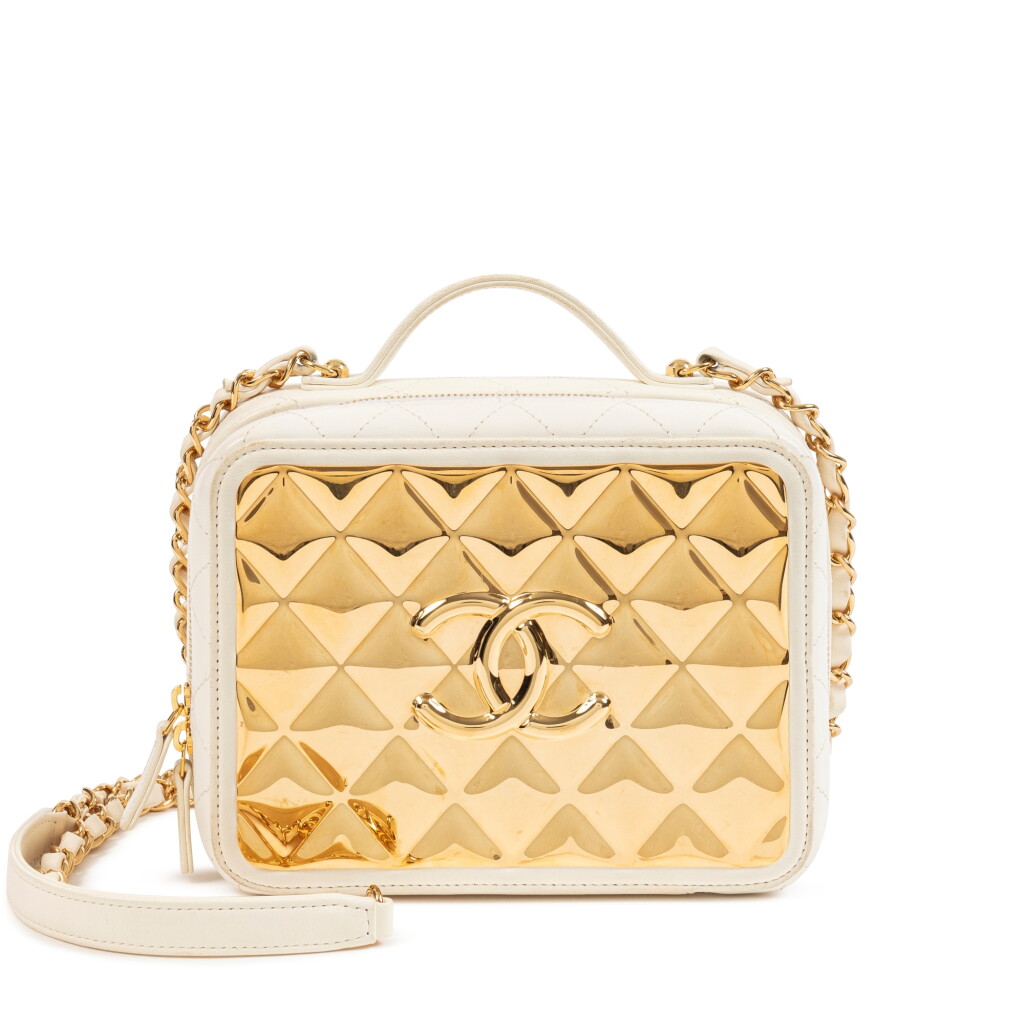 View full screen - View 1 of Lot 639. White Quilted Lambskin and Gold Vanity Case Gold Hardware.