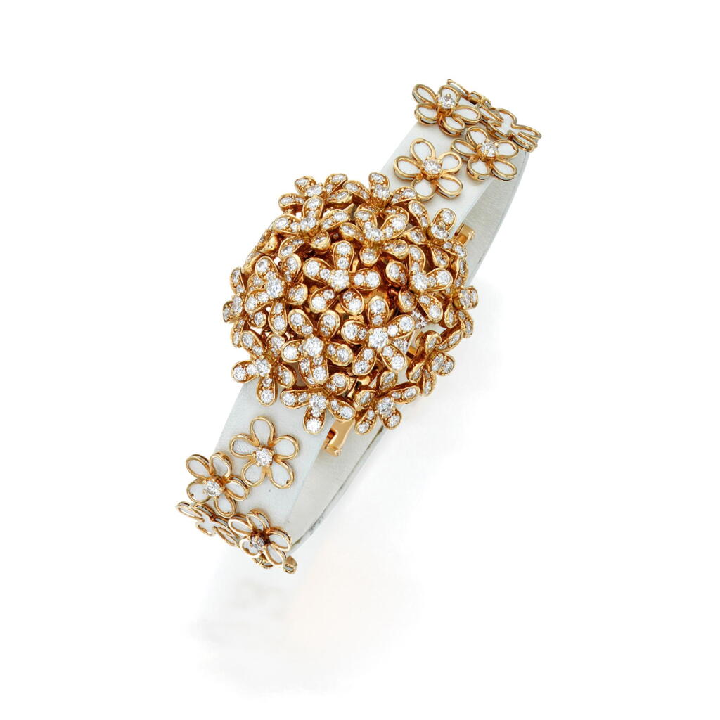 View full screen - View 1 of Lot 27. Van Cleef & Arpels | Gold, Mother-of-Pearl and Diamond 'Secrète' Bracelet-Watch, France.