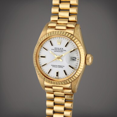 View full screen - View 1 of Lot 415. Reference 6917 Datejust | A yellow gold automatic wristwatch with date and bracelet, Circa 1981.